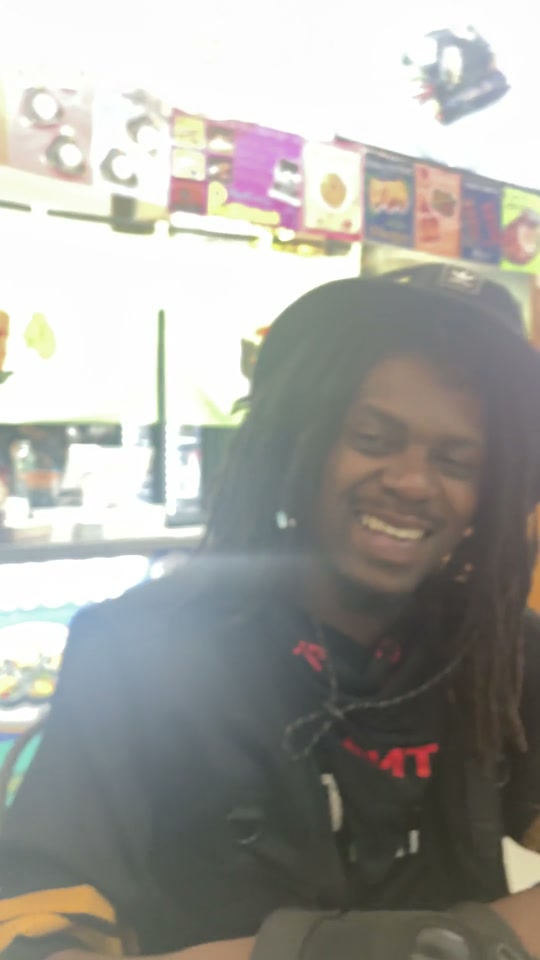 Kyle smiling at dinner